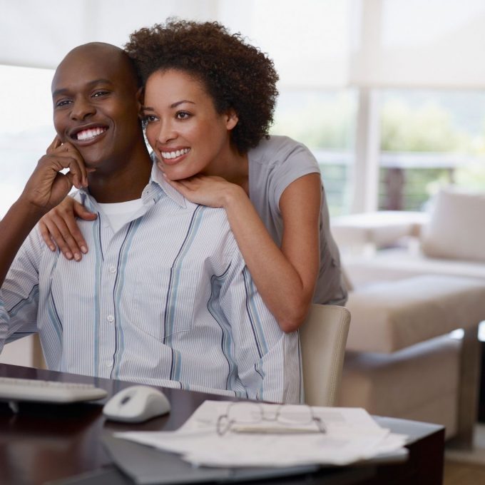 Couple discussing the costs of surrogacy