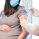 Pregnant woman getting the COVID vaccine