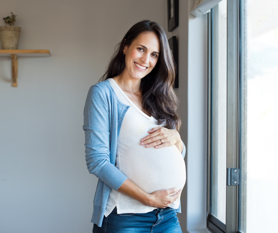 A pregnant surrogate, who benefits from surrogate compensation.